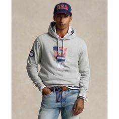 Part of the Polo Ralph Lauren Team USA Collection this cotton-blend hoodie features our iconic Polo Bear sporting the uniform Ralph Lauren designed for Team USA's flagbearer to wear during the Closing Ceremony of the Olympic and Paralympic Games Paris 2024. Cotton Sports Hoodie For Sports Events, Sporty Ralph Lauren Sweatshirt With Ribbed Cuffs, Ralph Lauren Sporty Sweatshirt With Ribbed Cuffs, Cotton Sportswear Hoodie For Sports Events, Athletic Heather Cotton Hoodie For Sportswear, Ralph Lauren Cotton Hoodie With Drawstring Hood, Cotton Sportswear Sweatshirt For Fan Gear, Cotton Sportswear Sweatshirt For Fans, Ralph Lauren Cotton Hooded Sweatshirt