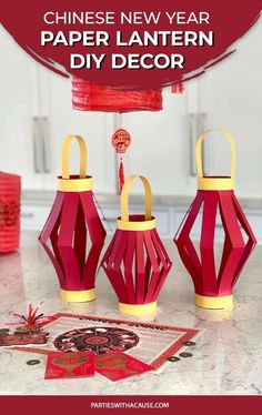 three red lanterns with the text chinese new year paper lantern diy decor