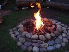 a fire pit with rocks around it