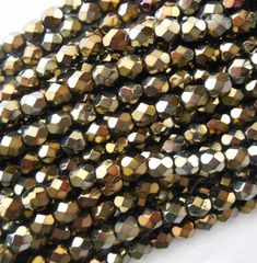 the beads are brown and gold in color