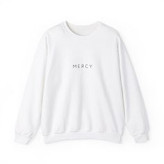 Embrace simplicity and faith with our Minimalist "Mercy" Sweatshirt. This cozy sweatshirt features a clean and elegant design with the word "Mercy" prominently displayed, making it a perfect addition to any wardrobe. Ideal for casual wear, church events, or as a thoughtful gift, this sweatshirt combines comfort and inspiration effortlessly. Key Features: Superior Comfort: Made with a medium-heavy fabric blend of 50% cotton and 50% polyester , this crewneck sweatshirt is extremely cozy and comfy and perfect for both active and leisure wear during those chilly months or nights. Perfect Fit: The classic fit and crew neckline provide a comfortable wearing experience with a sleek style, while the double-needle stitching at the shoulders, armholes, neck, waistband, and cuffs ensures exceptional Church Events, Sleek Fashion, Cozy Sweatshirts, Christian Inspiration, Minimal Design, Leisure Wear, Elegant Design, Casual Wear, Crew Neck Sweatshirt