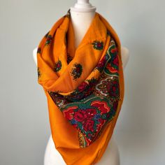 Traditional Floral Scarf is a perfect accessory for any season. The fabric has a soft feel to keep you warm and cosy. Fabric: Cotton Measurements: 46 inches x 46 inches Care: only cold wash with identical colors, do not bleach, If you have any questions please feel free to contact us. Thanks for visiting our shop. Bohemian Patterned Scarves For Fall, Orange Bohemian Shawl For Fall, Bohemian Paisley Print Scarves For Fall, Bohemian Paisley Print Scarf For Fall, Bohemian Patterned Scarves For Festival, Bohemian Shawl Scarf With Printed Border, Bohemian Winter Scarves For Festive Occasions, Bohemian Winter Festive Scarves, Traditional Fall Festival Scarves