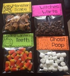 four bags of halloween treats on a table with labels that say ghost poop and witches wants