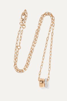 Pomellato's 'Iconica' collection is a celebration of the brand's traditional Italian craftsmanship. This necklace is strung with two pendants inspired by the house's [archival ring id1084153] - one is made from solid 18-karat rose gold, while the other is encrusted with 0.32-carats of shimmering VS diamonds. Layer it with similar styles. Elegant Rose Gold Cable Chain Necklaces, Elegant Rose Gold Necklace With Cable Chain, Elegant Rose Gold Jewelry With Cable Chain, Luxury Pendant Necklace With Cable Chain, Rose Gold Cable Chain Necklace For Everyday Luxury, Luxury White Gold Jewelry With Delicate Chain, Timeless Rose Gold Oval Pendant Necklace, Luxury Yellow Gold Necklace With Oval Pendant, Luxury Diamond Necklace With Round Pendant