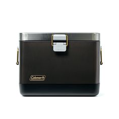 a black and silver cooler sitting on top of a white table