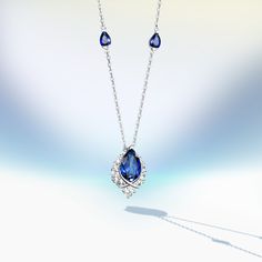 Introducing the captivating "ENDLESS BLUE" 5.41 Ctw. Pear Shaped Sapphire Necklace, a symbol of timeless elegance and environmental responsibility. This exquisite necklace is available in various options: S925 Silver, 10K Gold, 14K Gold, 18K Gold, and Platinum, allowing you to find the perfect match for your style and preference.At the heart of this necklace shines a brilliant lab-grown pear-shaped sapphire, reminiscent of the endless depths of the ocean. Surrounding the sapphire are glistening Luxury Blue Teardrop Pendant Necklace, Luxury Blue Pear-shaped Necklace, Elegant Sapphire Pear-shaped Necklace, Elegant Pear-shaped Sapphire Necklace, White Gold Sapphire Pear-shaped Necklace, Blue Pear-shaped Sapphire Necklace, Pear-shaped Sapphire Necklace In White Gold, Formal Sapphire Pear-shaped Necklaces, Formal Pear-shaped Sapphire Necklace