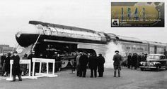 an old black and white photo of people standing in front of a train