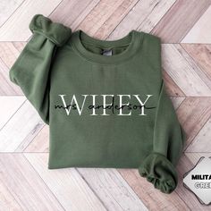 This unisex sized custom sweatshirt is super soft and makes an elegant Wifey sweatshirt for you to wear or a wonderful engagement gift for any Wifey or Future Mrs! Perfect for a Bachelorette Party or to wear on your honeymoon! Fantastic wedding gift for her special day! Wife Sweatshirt, Bride Hoodie, Bride Personalized, Wifey Sweatshirt, Name Sweatshirt, Mrs Sweatshirt, Bride Sweatshirt, Personalized Bride