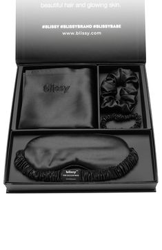 Get a blissful night's rest with this pure Mulberry silk sleep set that includes a pillowcase, sleep mask, and silk hair scrunchies. Includes sleep mask, travel pouch, pillowcase, and skinny scrunchies Hidden zip closure 100% silk Machine wash, tumble dry Imported Black Silk Sleep Mask, Blissy Silk Pillowcase, Best Silk Pillowcase, Xmas Wishlist, Classic Slippers, Silk Sleep Mask, Sleep Masks, Silk Eye Mask, Concert Looks