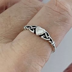 * Sterling Silver Heart with Celtic Triquetra Ring, Boho Ring, Dainty Ring, Statement Ring, Silver Ring, may also wear as a midi ring or thumb ring, 925 Stamped * The heart symbolizes true love, and the crown is for loyalty, Crown represents power glory, immortality, royalty and sovereignty * Perfect gift idea for any occasion: birthday, anniversary, engagement, graduation, bridesmaid, Mother's Day, Valentine's Day, Christmas, promise. * Your purchase includes a gift box. Let us know if this is Elegant Silver Hallmarked Heart Ring, Delicate Sterling Silver Heart Ring Gift, Symbolic Sterling Silver Heart Ring, Silver Heart-shaped Sterling Midi Rings, Hallmarked Sterling Silver Heart Ring, Celtic Triquetra, Celtic Ring, Silver Heart Ring, Midi Ring