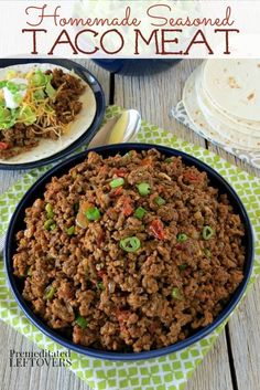 homemade seasoned taco meat in a blue bowl on top of a green and white napkin