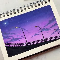 a drawing of a night scene with street lights and the moon in the sky above