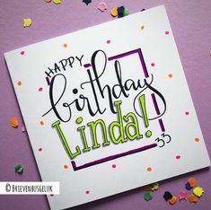 a birthday card with the words happy birthday linda on it and confetti scattered around