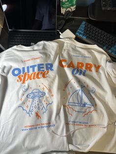 two t - shirts that say outer space and carry on with an image of a flying saucer