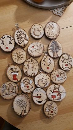 several wooden ornaments are arranged on a table