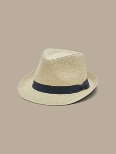 Luxuriously textured, this straw hat is specially woven in a herringbone pattern with a narrow brim and grosgrain band detail.  Adjustable drawstring inside the band creates a perfect, custom fit.  Interior circumference: Small 22", Medium 23", Large Classic Woven Panama Hat With Curved Brim, Classic Woven Panama Hat, Classic Woven Straw Hat With Short Brim, Classic Sun Hat With Curved Brim, Classic Woven Panama Hat For Vacation, Classic Woven Fedora In Toquilla Straw, Classic Woven Fedora From Toquilla Straw, Classic Woven Toquilla Straw Fedora, Classic Woven Sun Hat With Flat Brim