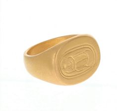 22K GOLD OVAL ENGRAVED SCARAB SIGNET RING • DESIGNED AND HAND FORGED IN NEW YORK • SIZE: 8 Please email info@elihalili.com or call the studio at 212-941-7979 for any inquiries. Ceremonial Gold Oval Signet Ring, Ceremonial Oval Gold Signet Ring, Gold Oval Engraved Ring For Ceremonial Occasions, Traditional Gold Oval Engraved Ring, Traditional Gold Oval Signet Ring, Traditional Oval Yellow Gold Signet Ring, Handmade Yellow Gold Oval Signet Ring, Handmade Oval Yellow Gold Engraved Ring, Gold Ceremonial Symbolic Signet Ring