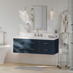 a bath room with a sink a mirror and a bath tub sitting next to each other