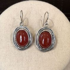 Sterling Silver Edged Carnelian Drop Dangle Earrings Shabool Didae Sterling Silver Drop Earrings Oval Carnelian Cabochon Measures Approximately: 13/4” Long X 5/8” Wide French Wire Hook Condition: Nwot, New Without Tags Ask Questions And/Or Request Additional Photos, Measurements As Needed Color May Vary Based On Shadows, Lighting, Monitor, Display Settings $168 En Route Jewelry Earrings, Elegant Carnelian Earrings, Round Carnelian Earrings, Red Round Earrings With Polished Finish, Classic Red Cabochon Earrings, Red Carnelian Earrings, Red Sterling Silver Earrings With Natural Stones, Silver Round Carnelian Earrings, Elegant Carnelian Teardrop Earrings