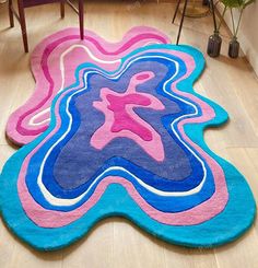 a colorful rug on the floor in a living room