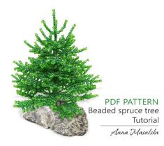 a small green tree sitting on top of a rock next to a white background with the words pattern beaded spruce tree