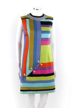 For Sale on 1stDibs - EMILIO PUCCI c.1960's 'Colletti' Print Multicolor Square Sleeveless Shift Dress Circa: 1960’s Label(s): Emilio Pucci; Exclusively for Saks Fifth Avenue Fitted Multicolor Sleeveless Dress For Evening, Retro Multicolor Evening Dress, Fitted Retro Multicolor Sleeveless Dress, Retro Sleeveless Evening Dresses, Retro Sleeveless Dress For Evening, Retro Multicolor Sleeveless Dress, Multicolor Retro Sleeveless Dress, Mod Sleeveless Lined Dress, Multicolor Sleeveless Mod Dress