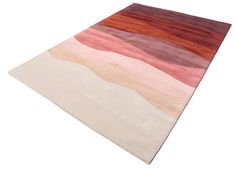 a multicolored area rug is shown on a white surface with no one in it