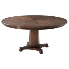 a round wooden table with two pedestals on one end and an oval shaped top