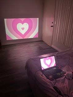 projection of a pink heart onto a wall from a computer in a cozy room Heart Pink Aesthetic, Projector Aesthetic, Projector Room, Room Projector, Pink Tv, Movie Projector Screen, Room Decor Cozy, Movie Projector