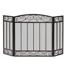 Add elegance to your fireplace and protect your carpet from sparks with this three panel deluxe scroll fire screen. With its curved, arched top and vertical bars flanked by a top and bottom border of interweaving scrolls, this fire screen provides a classic, European flair to your hearth. The 26-in wide, center panel rests in front of a large fireplace easily, supported by the two, 12-in wide, hinged side panels. Its 1/8-in, diamond mesh stops sparks from reaching your carpet, and the hinges mak Indoor Outdoor Fireplaces, Blue Comforter Sets, Fireplace Entertainment, Bedroom Fireplace, Fireplace Screen, Corner Fireplace, Fireplace Screens, Brushed Bronze, Affordable Home Decor