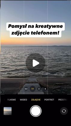 the screen is showing an image of water and sky with words above it that read pomy na kreatywne zdejece telefonem