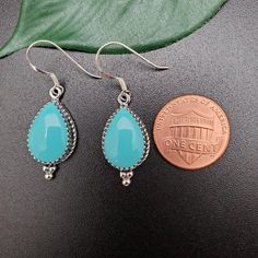 Visit our on-line shop at: Etsy.com/shop/AlbuquerqueDesigns *sterling silver earrings *dangles / drops *southwestern jewelry *kingman turquoise *calibrated pre-cut stones: 15x10mm teardrop shape *all jewelry items are made to ship, slight variations in stones will occur comparing to pictures *size of a penny is 19mm or a dime is 18mm in diameter for comparing size with jewelry items *handcrafted in USA *free convenient gift box *free shipping in US, ship from US without insurance *seller provide Southwestern Nickel-free Teardrop Earrings, Southwestern Turquoise Teardrop Earrings, Hypoallergenic Turquoise Teardrop Jewelry, Turquoise Nickel-free Southwestern Teardrop Earrings, Turquoise Sterling Silver Teardrop Dangle Earrings, Nickel-free Teardrop Turquoise Jewelry, Hypoallergenic Turquoise Drop Jewelry, Southwestern Turquoise Teardrop Earrings For Gift, Turquoise Teardrop Pendant Jewelry With Matching Earrings