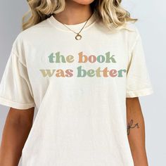 The Book Was Better, Book Lover, Bookish Gifts Shirts 2023  Bella Canvas Tee  This updated unisex essential fits like a well-loved favorite, featuring a crew neck, short sleeves and designed with superior Airlume combed and ring-spun cotton. Offered in a variety of solid and heather colors.  KEY FEATURES: - Solid Colors: 100% Airlume combed and ring-spun cotton - Heather Colors: 52% Airlume combed and ring-spun cotton, 48% poly - Semi-Fitted - Tear away label  CARE INSTRUCTIONS: Machine wash warm with like colors. Only non-chlorine bleach when needed. Tumble dry medium. Do not iron is decorated.  Bella Canvas Tee This updated unisex essential fits like a well-loved favorite, featuring a crew neck, short sleeves and designed with superior Airlume combed and ring-spun cotton. Offered in a va Literary Relaxed Fit Crew Neck T-shirt, Find Me, Book Nerd Shirts, Cute Teacher Outfits, Bookworm Shirt, Librarian Shirt, Nerd Shirts, Cross Shirts, School Librarian