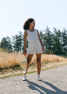 When only the most adorable will do: the Cowboy Dreams Shorts. Tiny blue cowboys dance across this soft cream cotton knit, trimmed with a ruffle hem and finished with a soft elastic waistband. Though inspired by vintage pyjamas, we're sure this style would love to be worn out of the house with the matching cami, or Cactus Clover Tee. Features Roomy pockets Fully elastic waistband Ruffle trim Decorative bow 100% vintage cotton, deadstock sourced Machine wash cold, hang to dry. Size chart - Sized for a relaxed lounge fit. If you are in between sizes, you can size down for a more fitted look. A note from the designer: Storytime. We were originally only going to include the camisole in this collection. But in the eleventh hour (aka - right before our photoshoot) we just couldn't resist whippin Vintage Pyjamas, Skirt And Cowboy Boots, Vintage Pajamas, Split Second, Lounge Top, Horse Print, Denim Cutoffs, Lounge Shorts, Horse Girl