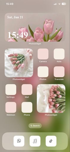 an iphone screen with pink flowers on it and the date for each phone is displayed