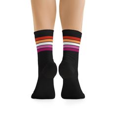 Stylish black lesbian socks with subtle lesbian sunset flag stripes. They complement your pride outfits during pride month or simply wear them daily for ultimate comfort. Perfect for lounging too they make a trendy accessory and lesbian pride gift. DETAILS• One size - very stretchy• Soft, comfy & cozy• Eco-friendly ♻ MADE FROM OVER 50% SUSTAINABLE MATERIAL58% recycled polyester, 22% nylon, 15% cotton and 5% elastaneThese socks are ONE SIZE and fit the following ranges US - 5 to 12 UK - 3 to 11.5 Modern Fitted Black Socks, Aroace Flag, Sunset Flag, Sublimated Socks, Pride Wear, Ace Pride, Asexual Pride, Lesbian Flag, Pride Outfit