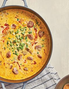 a skillet filled with food on top of a table