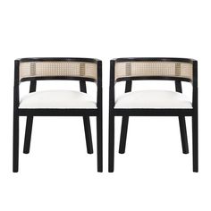 a pair of black and white chairs sitting next to each other