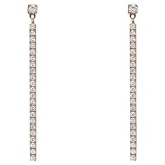 Shimmering round diamonds sway along these Messika Barrette Gatsby diamond long drop earrings. Crafted in 18K rose gold. Features a single row of pave set round brilliant cut diamonds with a prong set round diamond on the top. Secured with push back. Total diamond weight: 0.59 carat. Diamond color G and clarity VS. Earring length: 1.5 inches. Width: 1.6mm. Total weight: 3.61 grams. Comes with the original box and paper. Long Drop Earrings, Round Brilliant Cut Diamond, Gatsby, 18k Rose Gold, Prong Setting, Or Rose, Colored Diamonds, Round Diamonds, Original Box