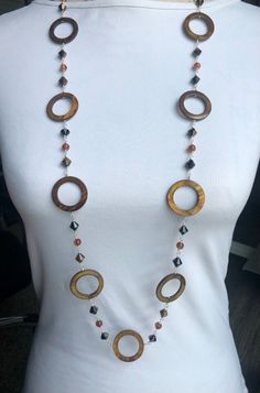 Classy, unique, a favorite fashion piece.  Hand crafted silver wire links with Tiger's Eye rings. Modern Brown Round Jewelry, Elegant Brown Circular Jewelry, Elegant Brown Chain Jewelry, Elegant Brown Jewelry With Chain, Eye Ring, Tiger Eye, Silver Wire, Ring Necklace, Unique Rings