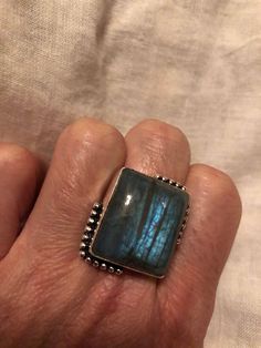 Vintage Large Blue Green Labradorite Stone Silver Ring https://www.etsy.com/listing/582480638/vintage-large-blue-green-labradorite?utm_source=crowdfire&utm_medium=api&utm_campaign=api Blue Labradorite Ring, Handmade Blue Moonstone Ring For Healing, Unique Blue Labradorite Ring, Bohemian Blue Labradorite Rings, Blue Labradorite Moonstone Ring, Bohemian Silver Rectangular Ring, Handmade Blue Moonstone Ring, Vintage Jewelry Sets, Vintage Jewels