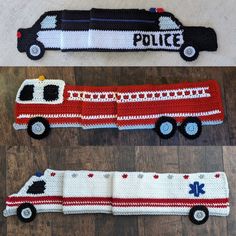 two crocheted firetrucks sitting on top of a wooden floor next to each other