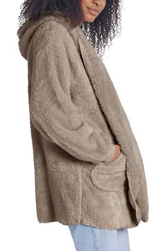 If a comfy robe and cozy blanket got together they'd create this wonderfully plush hooded wrap that's perfect for couch snuggles and coffee-shop hangouts. 32" length (size Small) Fixed hood Long sleeves 100% polyester Machine wash, line dry Imported Comfy Super Soft Loungewear Outerwear, Comfy Super Soft Outerwear For Loungewear, Cozy Soft Sleepwear For Relaxing At Home, Cozy Winter Sleepwear For Relaxing At Home, Comfy Super Soft Sleep Outerwear, Cozy Hooded Super Soft Sleepwear, Comfortable Hooded Outerwear For Lounging, Cozy Solid Super Soft Sleepwear, Cozy Solid Color Super Soft Sleepwear