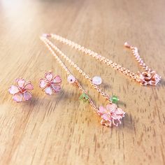 🌸 2 PACK | Hypoallergenic crystal floral stud earrings and necklace beads matching set. Beautiful romantic rose gold jewelry set for women, teens, and girls fashion.🌸 SAKURA | Dainty cute sakura cherry blossom designs are an iconic Japanese flower shown in this adorable, elegant beautiful design. Spring is here! Fantastic gift too for birthdays, weddings, and other special occasions.🌸 PINK | Pastel pink lacquer, green beads, and rose gold floral pendant, and sterling silver chain. High qualit Rose Gold Jewelry Set For Valentine's Day Gift, Pink Gold Jewelry With Clavicle Chain For Gift, Delicate Pink Gold Jewelry For Gift, Pink Clavicle Chain Jewelry For Mother's Day, Feminine Clavicle Chain Jewelry For Mother's Day, Feminine Rose Gold Flower Shaped Jewelry, Feminine Rose Gold Flower-shaped Jewelry, Gift Jewelry Sets With Clavicle Chain, Rose Gold Jewelry Sets For Gifts