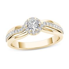 a yellow gold engagement ring with diamonds