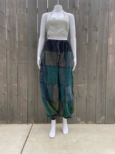 Stonewashed Bohemian Unisex Patchwork Pants One Size Fits : S - L  Fabric : Cotton Deep colored pants with a one color top band and then alternating monochrome colored patches throughout rest of pants.  Easy to wear and lightweight material that makes it great for all seasons.  Two deep pockets on each side  Great pants for traveling, lounging, and existing in. Great for festival, outdoor camping and general hippie vibes.  Comes in multiple colors as well as pant design. You can visit our page t Patchwork Trousers, Pant Design, Festival Mode, Patchwork Pants, Boho Patchwork, Boho Festival Fashion, Unisex Pants, Balloon Pants, Bohemian Festival