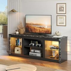 a living room with a television on top of it