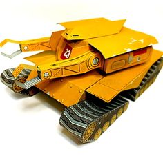 an origami model of a yellow tank