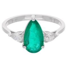 Make a statement with this stunning Gold Diamond Emerald Ring from our collection, designed to add a touch of timeless elegance to your jewelry collection. Crafted from 18k solid white gold, this ring features a dazzling emerald at the center. This ring is available in 10k/14k/18k, Rose Gold/Yellow Gold/White Gold. This is a perfect Gift for Mom, Fiancée, Daughter, Girlfriend, Wife and Grandmother. It can be worn on any occasion. Best Gift for Valentine’s Day, Mother’s Day, Easter, Christmas, Ne Elegant Gia Certified Pear-shaped Diamond Ring, Formal Pear-shaped Emerald Ring In White Gold, Fine Jewelry Pear-shaped Emerald Ring With Vvs Clarity, Fine Jewelry Pear-shaped Emerald Ring Vvs Clarity, Formal Gia Certified Pear-shaped Rings, Classic Pear-shaped Gemstone Rings, Luxury Pear-shaped Platinum Rings, Luxury Platinum Pear-shaped Rings, Classic Pear-shaped Green Ring