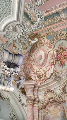 an ornately decorated ceiling in a building